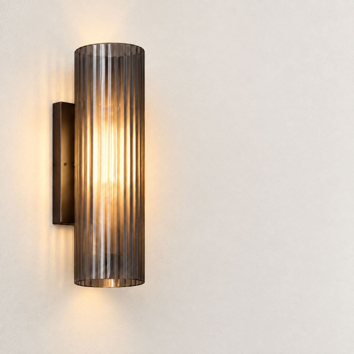 Nerra Ribbed Glass Wall Sconce feature and light-distribution view